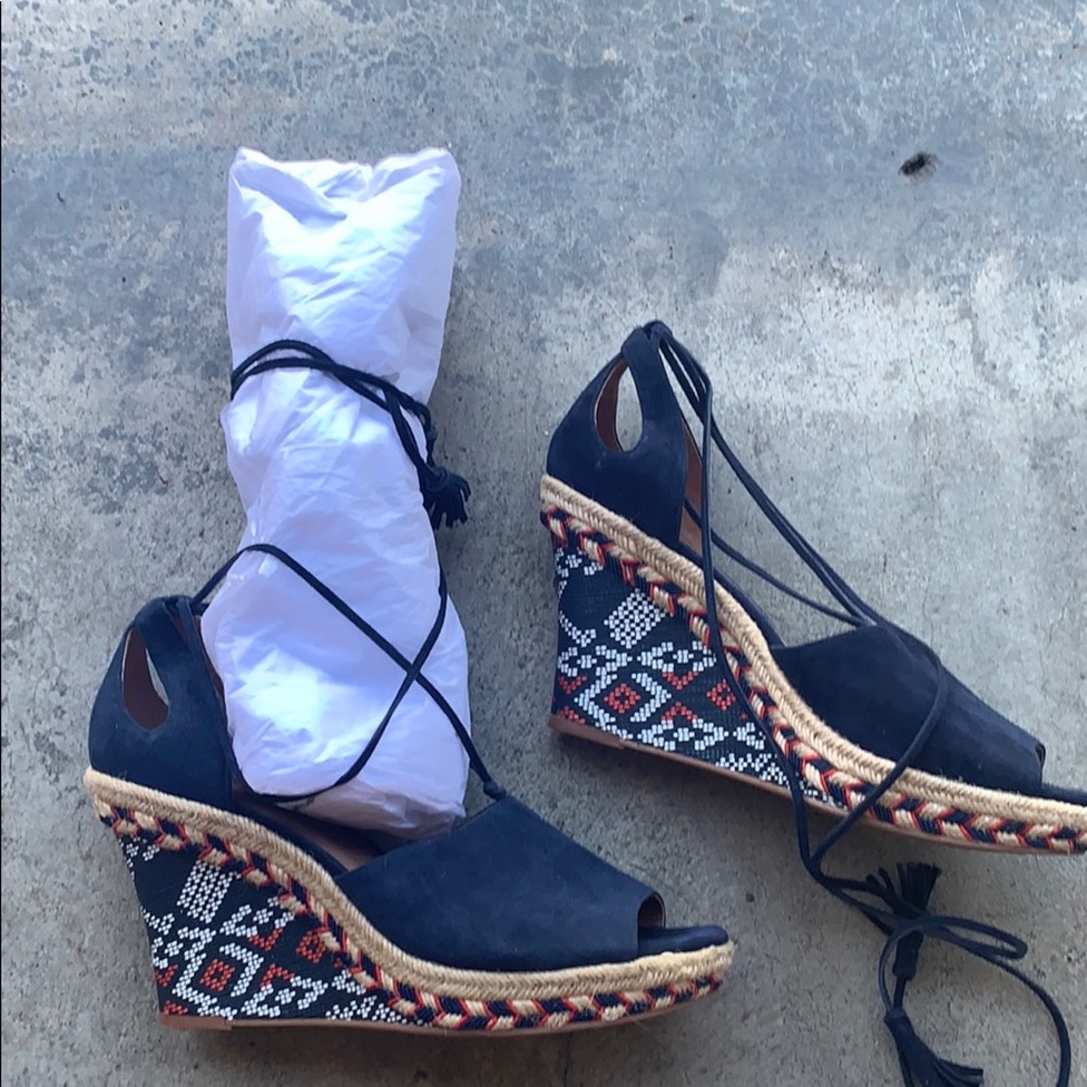 9 1/2 size women’s strap up wedge sandals.